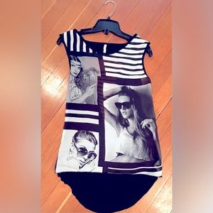 Slashed back off the shoulder top. Sheer front silky fabric. Size S